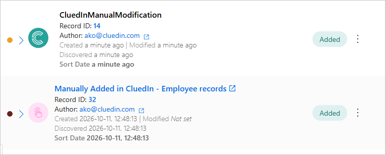 The data part view listing two data parts, each with a color circle for its branch, source, record ID, author, dates and an Added status